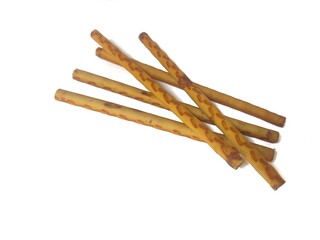 biscuit sticks with sweet chocolate filling on white background