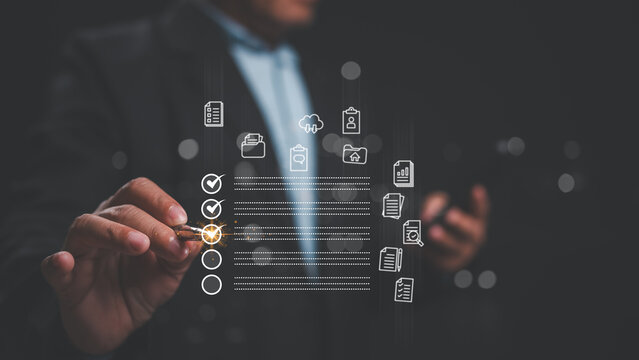 Professional engages with digital tools to enhance productivity, signifying integration of technology in time management and organizational efficiency through visual checklists and data tracking