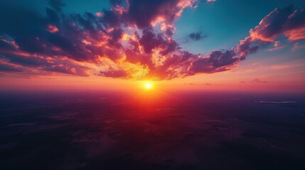 Fototapeta premium Breathtaking Sunset Over Horizon with Colorful Clouds and Vibrant Sky at Dusk, Capturing the Beauty of Nature's Evening Palette