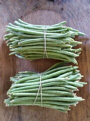 two groups of bean fruit on table
