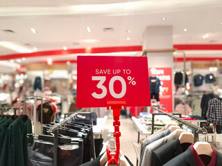 Obraz premium sale 30% off mock up advertise display frame setting over the clothes line in the shopping department store for shopping, business fashion and advertisement concept 