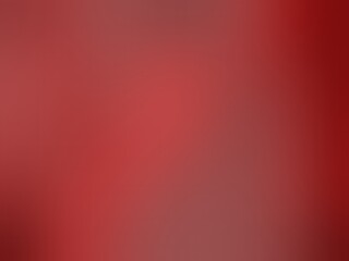 Soft, blurred red gradient background with subtle color variations.