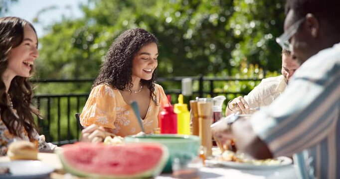 Food, talking and barbecue with friends in garden for celebration, summer vacation or lunch. Share, party and eating with group of people on patio of home for social event, reunion and bbq together