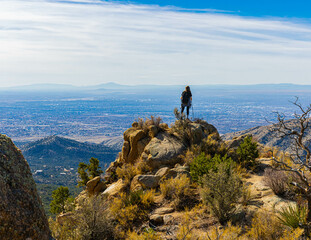 Female Hiker on Rocky Outcrop on El Rincon, Piedra Lisa South Trail , Sandia Wilderness Near...
