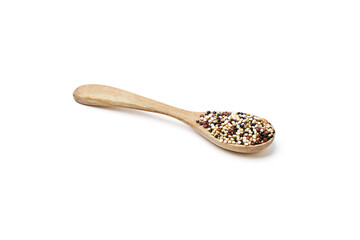 Organic Tri-color Quinoa (Mixed Quinoa) placed on wooden spoon isolated on white background. Quinoa is a round seed that is high in protein, high in energy, and rich in high fiber.