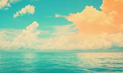 Serene ocean view with vibrant clouds and a colorful sky at sunset.