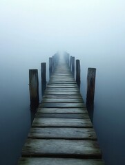 Obraz premium Misty Dock Leading to Mysterious Horizon in Tranquil Lake Landscape