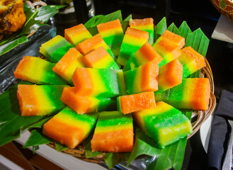 Layer cake, a traditional sweet snack made from flour in colorful layers, originating from...