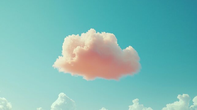 Single pink cloud in a blue sky.