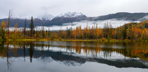 Fototapeta premium Scenic view of Reflection lake in Alaska during autumn time.