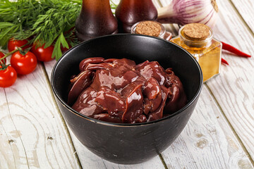 Raw chicken liver uncooked in the bowl