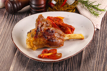 Baked lamb shank with vegetables