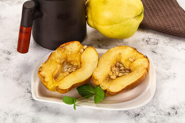 Baked quince with honey and cedar