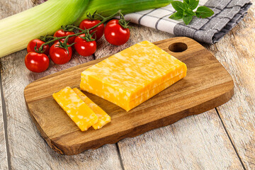Marble yellow cheese with slices