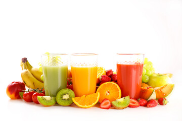 Freshly squeezed fruit juices with fresh fruits on white background