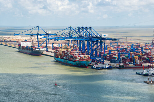Aerial view, top view cargo ship port in the export, import business and logistics international goods in Cat Ba Islands, Hai Phong City, Vietnam
