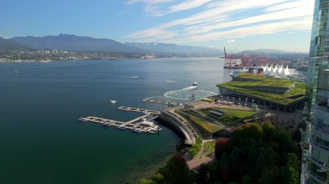 Floatplane Base, Burrard Landing Mall And Canada Place From Harbour Green Park In Vancouver, BC, Canada. - aerial shot