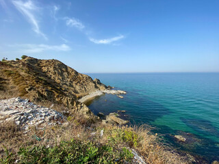 Fototapeta premium rocky coast of the blue sea