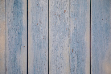 blue grey cracked paint on wooden fence background texture