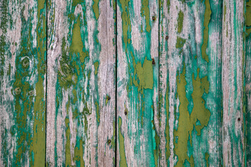 old cracked green paint on wood timber planks texture background