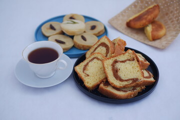 sponge cake and rice cake on a plate with beautiful decoration