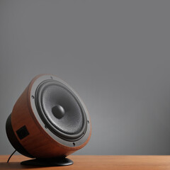 speakers on a wooden table with copy space