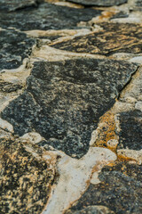 Rustic stone wall texture background for architectural and design projects