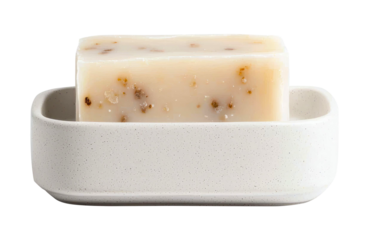 Natural soap bar with visible herbs placed in a white speckled ceramic dish. Perfect for bathrooms or kitchens, combining functionality and rustic elegance. Isolated on transparent background, png.