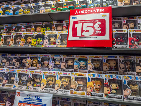 France, 19 August 2024: Funko Pop figurines displayed for sale at discounted price in a store.