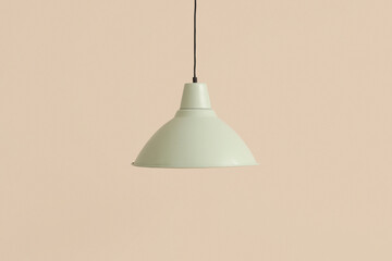 Obraz premium White pendant lamp on beige background