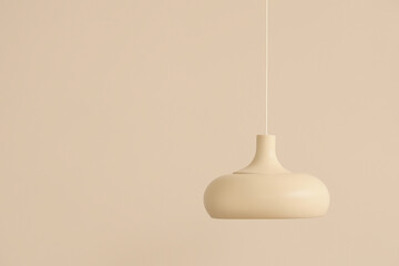 White pendant lamp on beige background