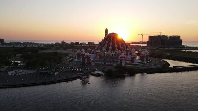 Masjid Kubah 99 Asmaul Husna At Sunset - Waterfront Mosque In Sulawesi Selatan, Indonesia. drone shot