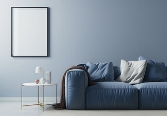 Minimalist living room interior with a blue sofa. a coffee table. and a blank picture frame