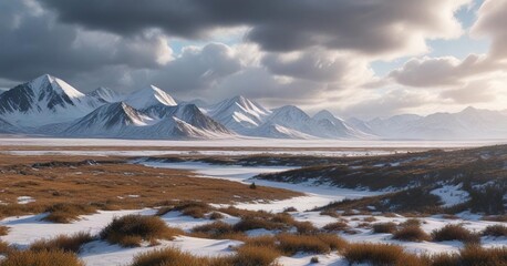 Cloudy sky over tundra landscape with snow-capped mountains and cloudy atmosphere in Yukon Panorama , frozen lake, alpine scenery