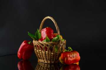 ripe red and yellow sweet peppers.