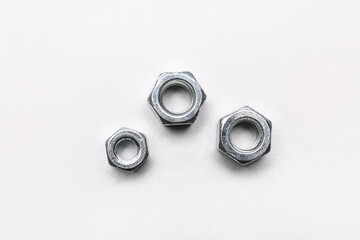 Chrome nuts isolated on white background
