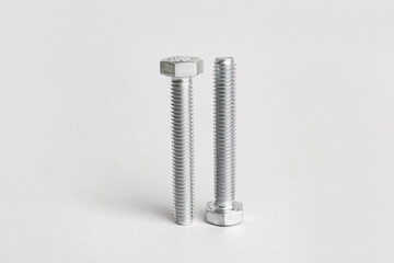 Tap bolts on white background