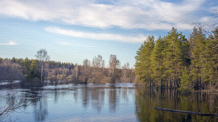 Calm lake with trees in the background