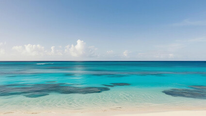 Obraz premium serene tropical beach with crystal clear turquoise water, white sand, and cloudless blue sky