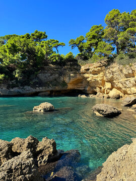 Turquoise sea bay and rocks of Mediterranean coast.