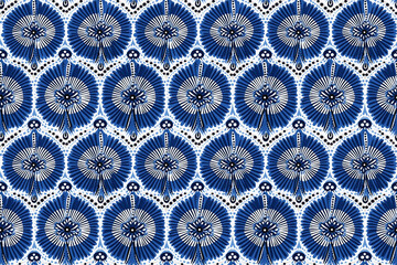 Seamless blue and white african wax cloth style pattern