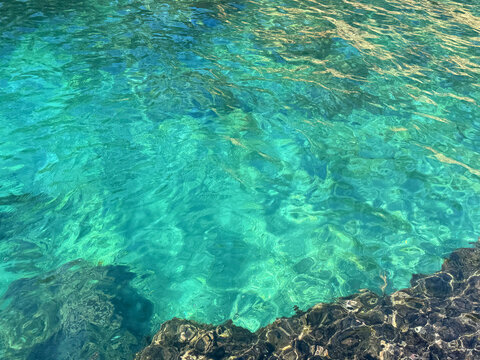 Perfect clean and clear sea water blue turquoise.