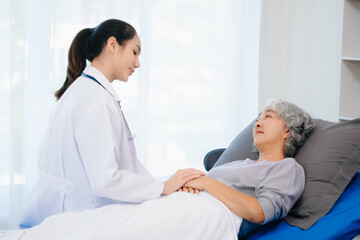 Smiling doctor discussing health with elderly patient. Perfect for medical, healthcare, caregiving,