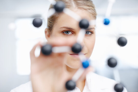 Science, portrait and woman with molecule structure for hypotheses testing and behavior of atom in biology system. Scientist, professional and 3D model with analysis for compound property prediction