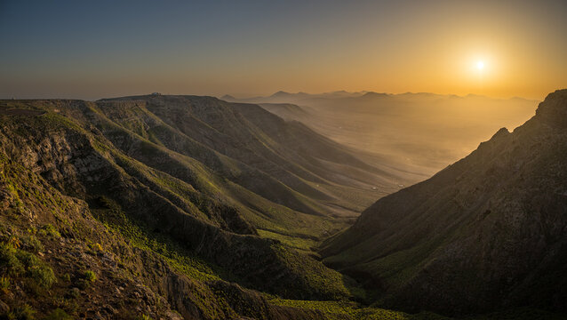 Distant view towards Timanfaya Nationalpark at sunset from Famara cliffs, Teguise, Lanzarote, Spain