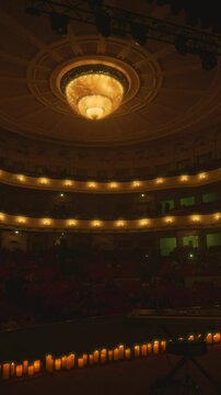 An ancient concert hall.
Opera hall.
Opera theater.
Chandelier at the Opera House.
An antique chandelier on the ceiling.