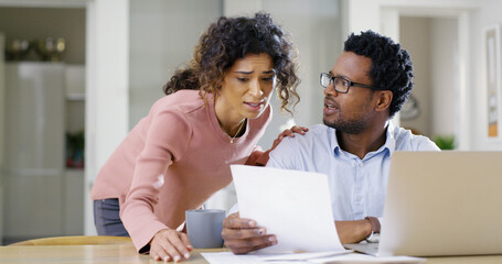 Frustrated, interracial couple and documents with laptop or eviction notice for financial crisis,...