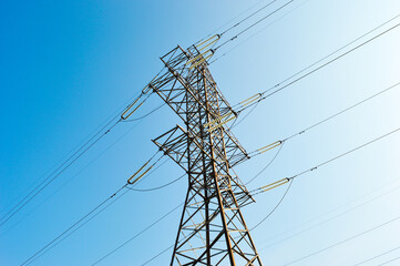 Power lines on blue sky background