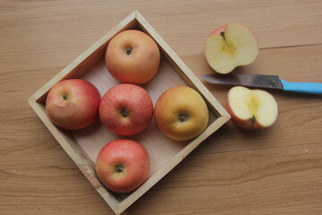 apples on a wooden table