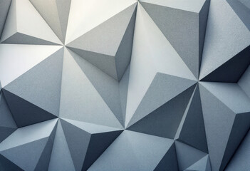 A geometric pattern of gray triangular shapes arranged in a repeating, angular design